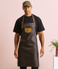 PR136 Division waxed-look denim bib apron with faux leather